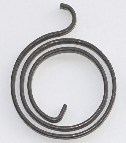 Coiled metal spring on a white background